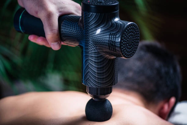 The Ultimate Recovery Combo: How to Use a Massage Gun and a Kinesiology Tape for Double Recovery